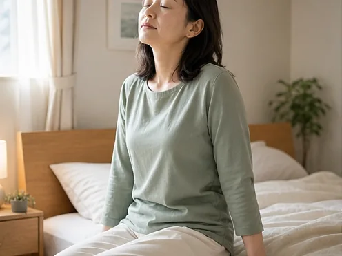 朝に落ち着いて呼吸する女性